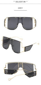 Three-view display of oversized rivet sunglasses with grey lenses and gold frames