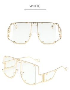 Macro detail of white square flat top sunglasses with gold rivet accents and metal frame