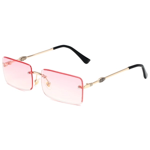 Frameless square metal sunglasses with pink gradient lenses and vintage gold temples