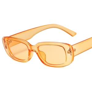 Petites lunettes de soleil rectangulaires orange translucide avec monture minimaliste