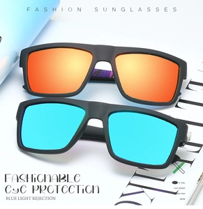 Detail of polarized sports sunglasses with orange and blue gradient mirrored lenses