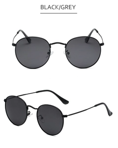 Detail view of round metal sunglasses in black and grey showing front and side angles