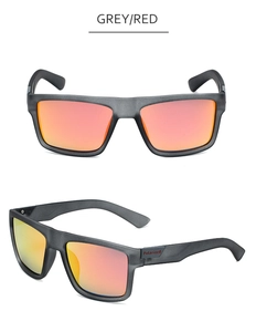 Polarized sunglasses detail in grey and red with matte frame and orange lenses