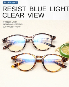 Macro detail of anti-blue light round tortoise shell glasses with clear protective lenses