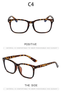 Detail view of tortoiseshell eyewear frame with stylish silver metal rivets and square design