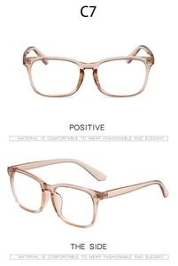 Detail view of tea-colored transparent square frames with lightweight resin material