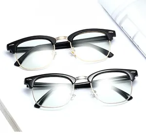 Detail of vintage browline glasses frames with polished metal accents and classic nose bridge