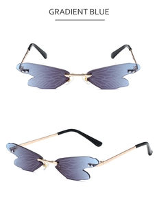 Detail of dragonfly wing rimless sunglasses in gradient blue with gold metal frame