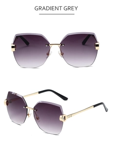 Elegante randlose Sonnenbrille für Damen mit grauen Verlaufsgläsern und Strasssteinen