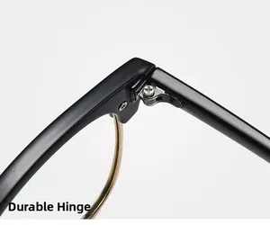 Detail of the sturdy metal hinge and screw construction on these semi-rimless glasses