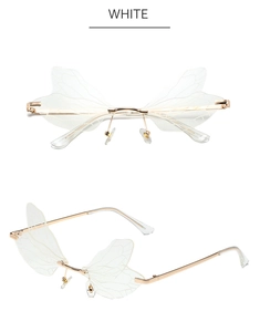 Détail de lunettes de soleil ailes de libellule blanches avec monture dorée et texture