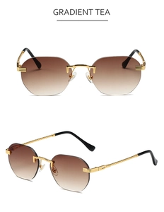 Detail of rimless gradient tea sunglasses with textured golden metal temples and arm tips