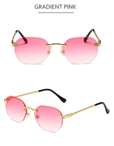 Detail of rimless metal sunglasses featuring pink gradient lenses and gold spiral temples