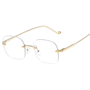 Lunettes carrées sans monture à la mode avec cadre en métal doré et verres transparents chic