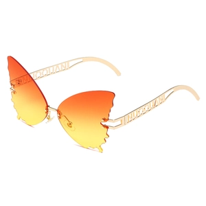 Chic rimless butterfly shaped sunglasses with orange gradient lenses and gold metal frames