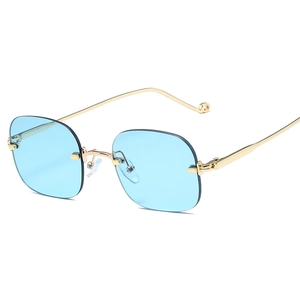 Lunettes sans monture anti-lumière bleue avec verres bleu clair et branches dorées