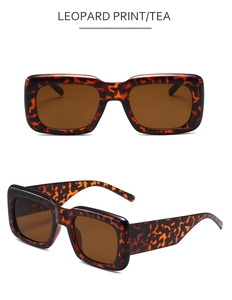 Detail view of leopard print square sunglasses with thick frames and tea tinted lenses