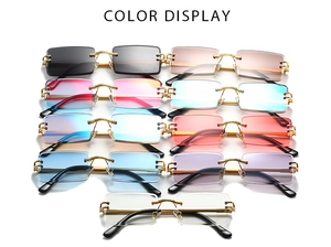 Color display of nine rimless rectangular sunglasses with metallic textured temples