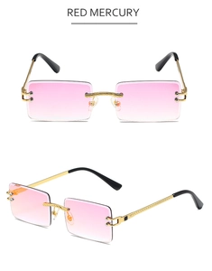 Detail view of pink gradient rimless sunglasses with gold metal twisted bridge