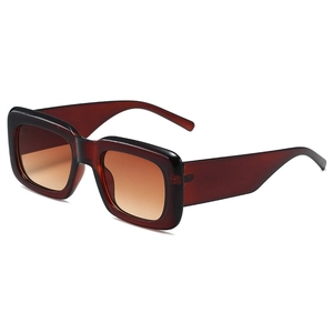 Fashionable oversized square sunglasses with dark translucent brown frame and gradient lenses