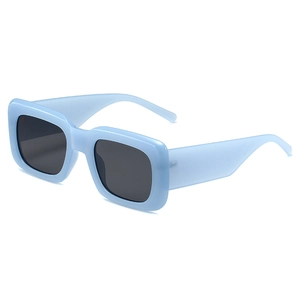 Modern light blue square frame sunglasses with dark grey lenses in a 45-degree angle view