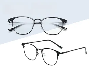 Detail of semi-rimless black silver and full black metal frames with silicone nose pads