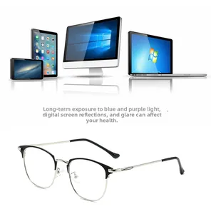 Detail view of anti-blue light glasses with black and gold frames for digital eye protection