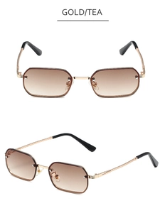 Detailansicht der goldfarbenen randlosen Sonnenbrille mit braunen Verlaufsgläsern und Metallbügeln