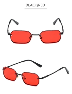 Detailansicht der randlosen quadratischen Sonnenbrille mit roten Gläsern und Metallrahmen