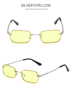 Detail einer randlosen silbernen Sonnenbrille mit gelben Gläsern im Steampunk-Stil