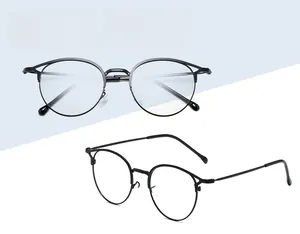Double vue de montures rondes en métal montrant le profil face et côté des lunettes anti-lumière bleue