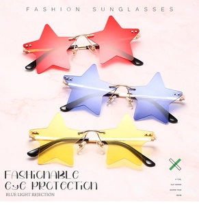 Close-up of star-shaped rimless sunglasses in red, blue, and yellow with gold frames