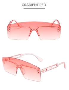 Detail of gradient red oversized sunglasses with rivets and hollowed-out geometric temples