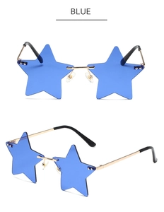 Macro detail of star-shaped rimless sunglasses with blue ocean lenses and gold metal frames