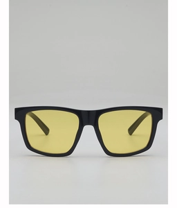 Detail of square black frame sunglasses with yellow lenses for outdoor sports and fashion