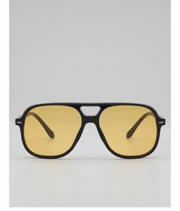 Vue de face de lunettes de soleil aviateur à large monture et verres jaunes