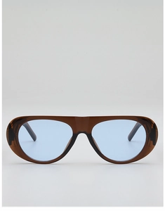 Detail view of jelly brown pilot sunglasses with light blue lenses and wide bridge