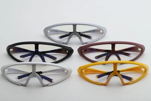 Detailed row of cycling sunglasses in five colors from silver grey to bright yellow