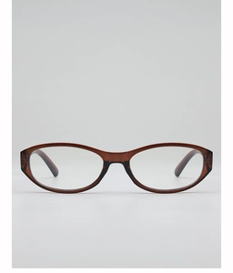 Détail macro d'une monture de lunettes ovale marron translucide avec une finition lisse