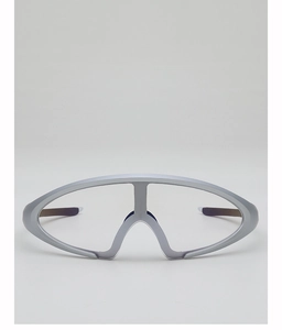 Macro view of matte silver futuristic eyewear with streamlined frame and reinforced bridge