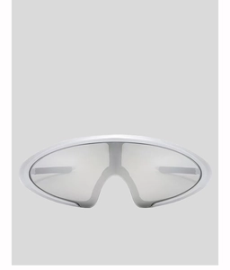Close-up of silver futuristic sports cycling sunglasses with wrap-around shield lens
