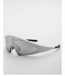 Close-up of silver futuristic sports sunglasses with wraparound frame and gray lenses