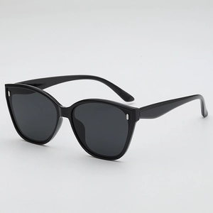 Lunettes de soleil œil-de-chat noires classiques avec rivets et verres anti-UV
