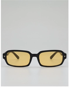 Detail of black rectangular sunglasses with amber lenses and silver star rivets