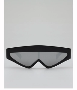 Detail view of full-frame shield sunglasses in matte black with dark grey lenses
