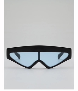 Detail of oversized black wrap sunglasses with light blue lenses and unique V-cut bottom