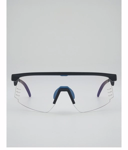 Detail of polarized cycling sunglasses featuring airflow vents and blue anti-slip nose pads