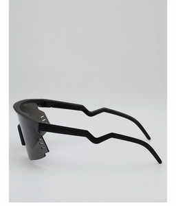 Detail view of sports sunglasses featuring wavy temples and anti-fog side ventilation slots