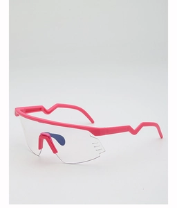 Close-up of pink frame cycling glasses with lightning-shaped temples and clear large lens