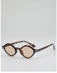 Detail of tortoise shell sunglasses with diamond lenses and metallic temple accents